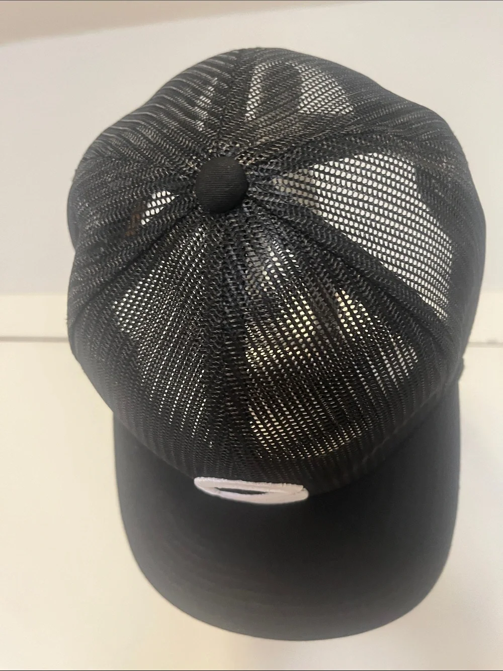 Extracurricular Black Mesh Trucker Cap with White Embroidered Logo
